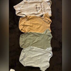Set of Four Baby Bodysuits in Neutral Tones